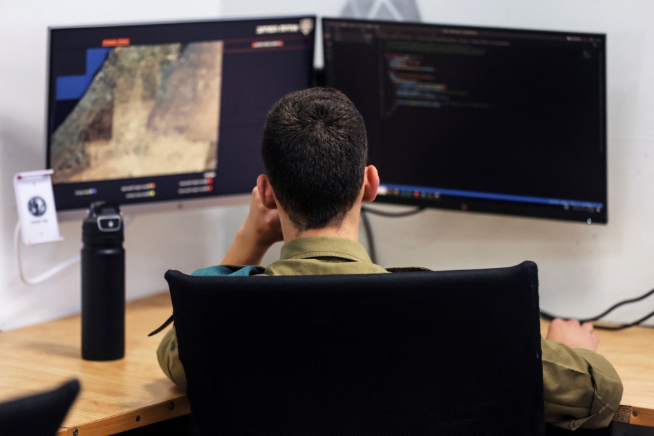 A technologist with the Israeli military's Matzpen operational data and applications unit works at his station, at an Israel Defense Force base in Ramat Gan, Israel, June 11, 2023. 