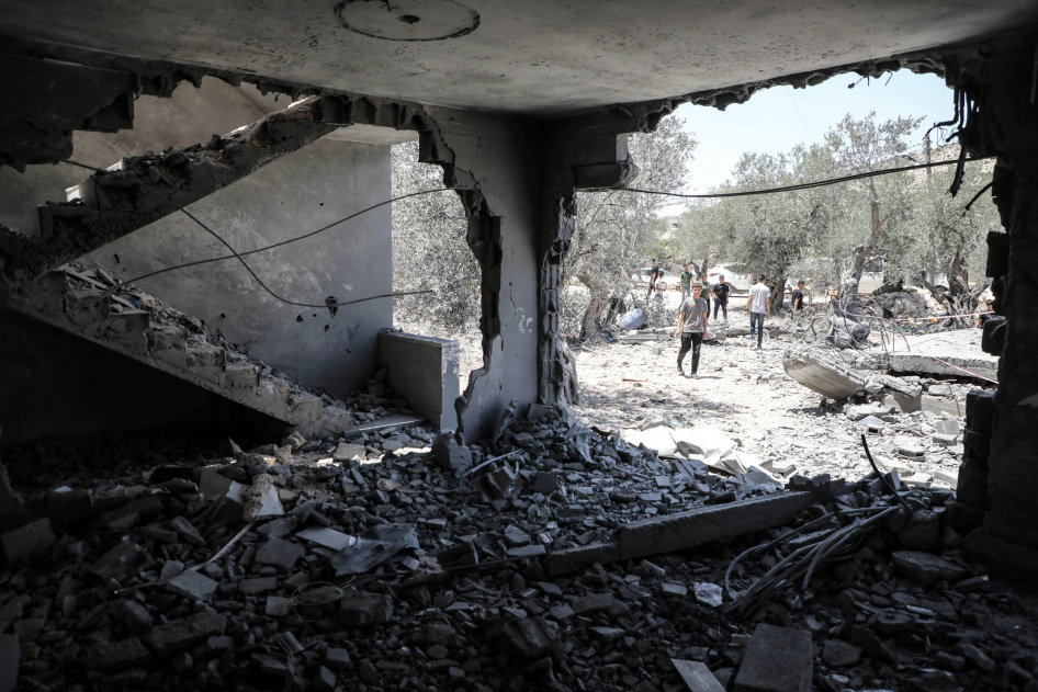 Palestinians inspect a house demolished by Israeli military forces in the town of Qabatiya in the Israeli occupied West Bank, June 3, 2026. 