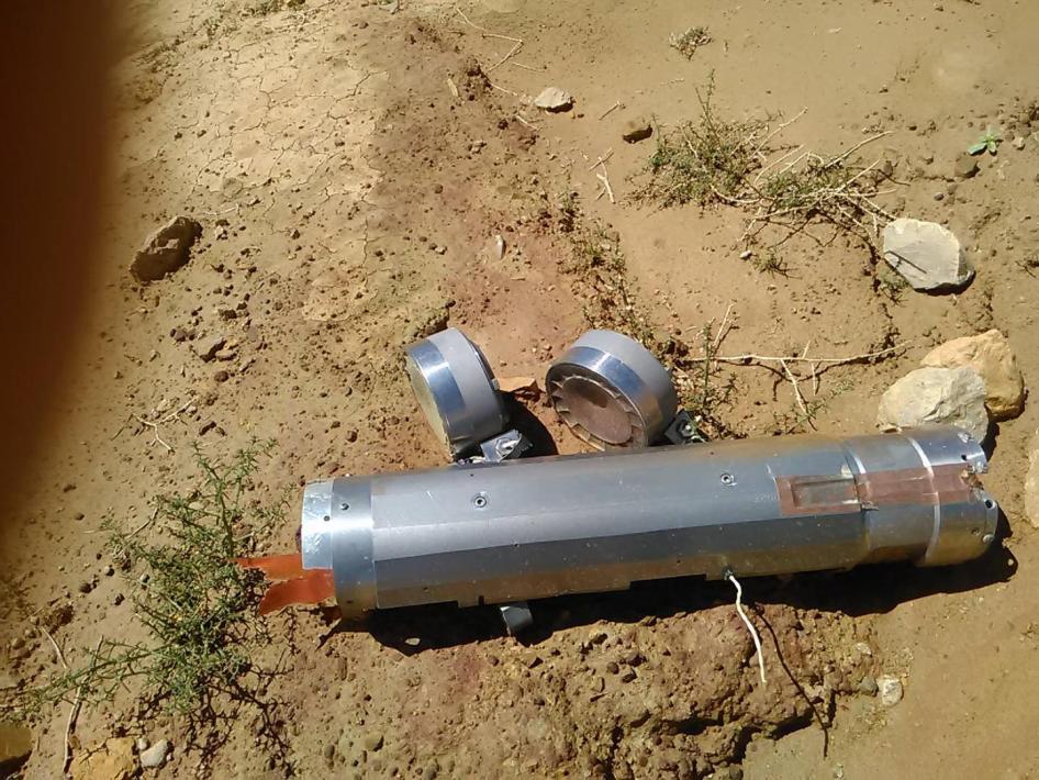 A failed BLU-108 canister, with two submunitions still attached, that was delivered by a CBU-105 Sensor Fuzed Weapon during an attack on the quarry of the Amran Cement Factory on February 15, 2016.
