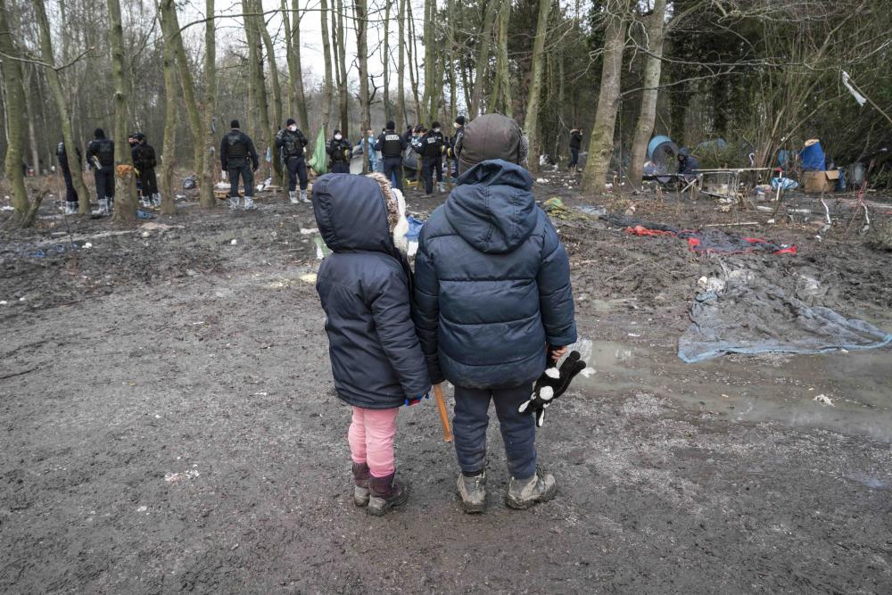 Enforced Misery: The Degrading Treatment of Migrant Children and Adults in  Northern France | HRW