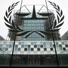The International Criminal Court logo shows in front of building. 