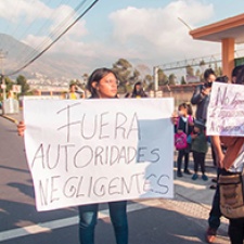 Protestors outside a school denouncing a reported case of sexual violence against a student, in Quito, Ecuador