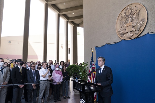 US Secretary of State Antony Blinken greets staff members at the US Embassy in Cairo, Egypt, May 26, 2021. 