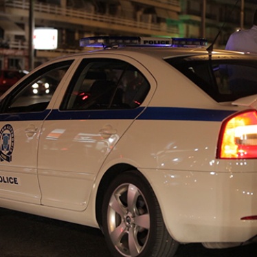 A police car on the side of the road in Athens. 