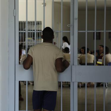 A young inmates looks at another group of fellow inmates during choir practice at the Las Garzas de Pacora detention center, Panama, Wednesday, Jan. 16, 2019.