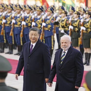 Brazilian President Luiz Inacio Lula da Silva (R), along with Chinese President Xi Jinping, attends a welcome ceremony at the Great Hall of the People in Beijing on April 14, 2023.