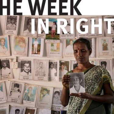 A woman stands in front of a wall of photos of disappeared people, with the words ' Week in Rights' on top