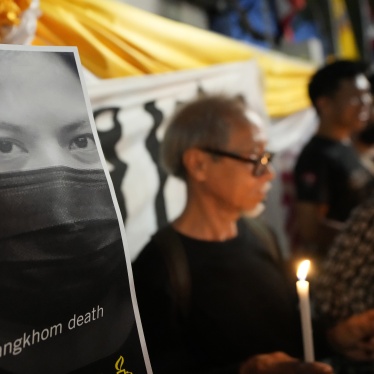 Thai activists hold a portrait of Netiporn “Bung” Sanesangkhom outside of a criminal court in Bangkok, Thailand, on May 14, 2024.