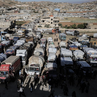 Syrian refugee trucks and cars prepare to leave Lebanon back to Syria, May 14, 2024. 
