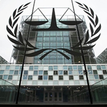 The International Criminal Court logo shows in front of building. 