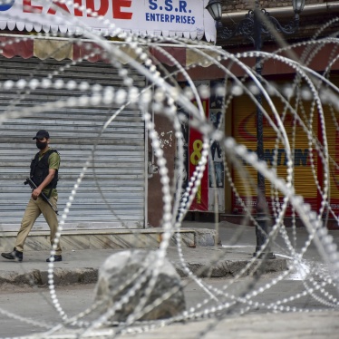 A paramilitary trooper patrols along a deserted road during India's Independence Day celebrations in Srinagar, in Jammu and Kashmir, August 15, 2021.
