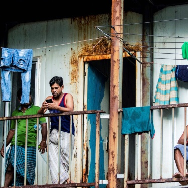 Workers from Bangladesh gathering in their accommodation block in Malé, Maldives, May 9, 2020. 