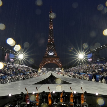 Rain pours down in Paris, France, during the opening ceremony of the 2024 Summer Olympics, Friday, July 26, 2024.