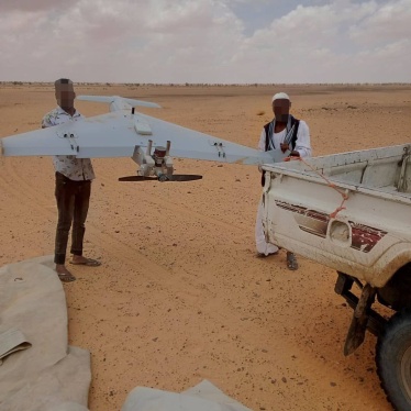  Sudanese armed forces with an unexploded, one-way attack drone from the Rapid Support Forces recovered from an attack on a government building in Gedaref, Sudan, July 11, 2024. 