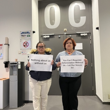 Dayang Ukau (L) and Celine Lim, leaders of the Indigenous organizations KERUAN and SAVE Rivers respectively, protest Malaysia's refusal to allow in-person civil society participation at the EU-Indonesia-Malaysia Joint Taskforce on the EU Deforestation Regulation outside the meeting room, Brussels, September 12, 2024.