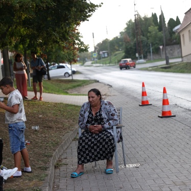 A Ukrainian woman of Roma ethnicity sits on a chair on the street, after losing access to subsidized accommodation in Komárom-Esztergom county, Hungary, August 21, 2024. 