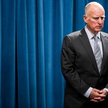 California Governor Jerry Brown waits to speak during a news conference at the State Capitol in Sacramento on March 19, 2015.