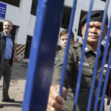 British rights activist Andy Hall arrives at the Phra Khanong Provincial Court in Bangkok, Thailand on October 29, 2014. 