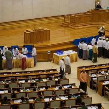 Members of parliament cast ballots in Naypyitaw on June 25, 2015. 