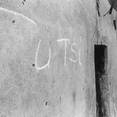 One of many houses marked with the word “Tutsi” stands in a deserted village in eastern Rwanda, just a few kilometers from a church at Nyarubuye in which more than 1,000 people were massacred by Hutu militiamen.