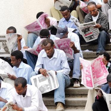 Newspaper readers at Arat Kilo, a square in Addis Ababa, Ethiopia.