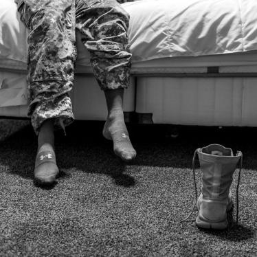 A US Army specialist and military sexual assault survivor on her bed in Fayetteville, North Carolina.
