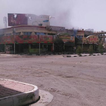 Smoke from shops in Fallujah a witness said Popular Mobilization Forces burned on June 27 