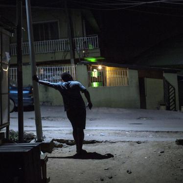 A gay man in Bariga, a neighborhood in Lagos, Nigeria, who said he hides his identity from his friends and family.