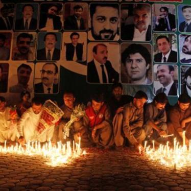 People hold a candlelight vigil for those killed in the August 8, 2016 blast in Quetta, Pakistan.