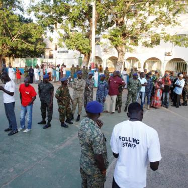 Gambians wait in line to vote during the presidential election in Banjul, Gambia, December 1, 2016.