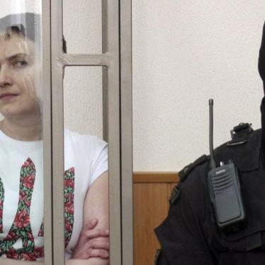 Nadezhda Savchenko looks out from a glass-walled cage during a verdict hearing at a court in the southern border town of Donetsk in Rostov region, Russia March 21, 2016