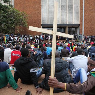Supporters of Zimbabwean Pastor Evan Mawarire, outside the Harare Magistrates Court during his trial on July 13, 2016.
