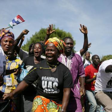 Supporters of Gambian President Adama Barrow, who was inaugurated at the Gambian Embassy in neighbouring Senegal, gather to receive him as he arrives from Dakar, in Banjul, Gambia January 26, 2017.