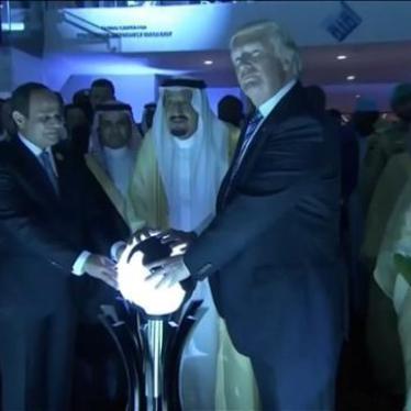 US President Donald Trump places his hands on a glowing orb in the Global Center for Combatting Extremist Ideology in Riyadh, Saudi Arabia, May 22, 2017.