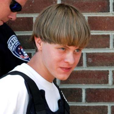 Police lead shooter Dylann Roof into the courthouse in Shelby, North Carolina on June 18, 2015.