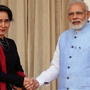 Myanmar's State Counsellor Suu Kyi shakes hands with India's Prime Minister Modi during a photo opportunity ahead of their meeting in New Delhi, October 19, 2016.