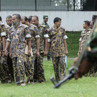 Members of the Bangladesh Rifles (BDR) are summoned for a hearing before a special court in Dhaka, July 12, 2010. 