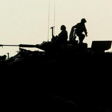 British soldiers prepare their armored vehile to patrol Ahmed al-Ahmedi, 30 miles south west of Baghdad, November 5, 2004.