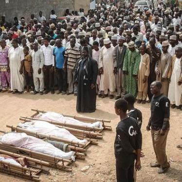 Sanusi Abdulkadir, a leader of the Islamic Movement in Nigeria (IMN) leads on November 16, 2016 in Kano the funeral prayers for the some of the victims of clashes that broke out on November 14 between police and members of the Islamic Movement in Nigeria 