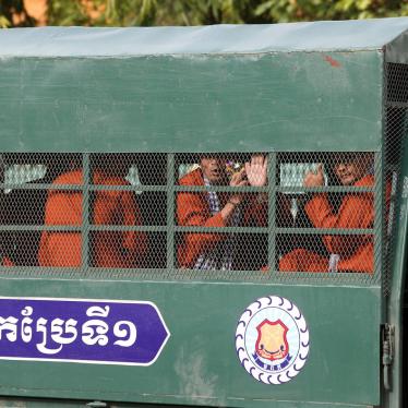 Members of the dissolved opposition Cambodia National Rescue Party are brought in a police vehicle to the appeals court in Phnom Penh, Cambodia, May 10, 2018.