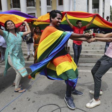 People celebrate the Indian Supreme Court decision to strike down a colonial-era law criminalizing same-sex conduct, in Bangalore, India, September 6, 2018.