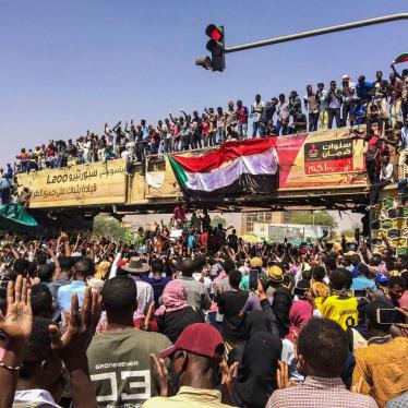 Protesters rally at a demonstration near the military headquarters, Tuesday, April 9, 2019, in the capital Khartoum, Sudan. 