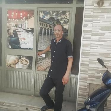  Imed Zaghouani outside his café in Kairouan, Tunisia.