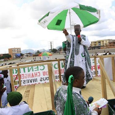 Ni John Fru Ndi speaks to his supporters during a campaign rally in Yaounde, Cameroon