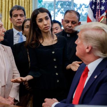 President Donald Trump listens to Nobel Peace Prize winner Nadia Murad, a Yezidi from Iraq in the Oval Office of the White House