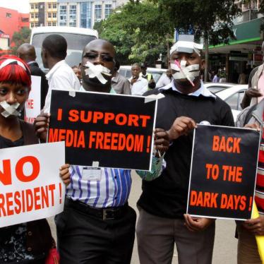 Kenyan journalists wear tape over their mouths to signify being silenced