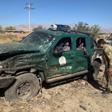 Afghan police inspect the site of a suicide attack in Parwan, Afghanistan, September 17, 2019. 