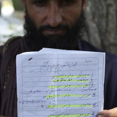 Abdul Jabar, who lost four family members, shows a list of villagers who were killed in a September 19, 2019 airstrike in Jalalabad, Afghanistan, October 1, 2019. © 2019 AP Photo/Rahmat Gul