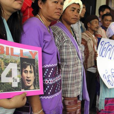 Karen activists hold a picture of Billy during a rally following his disappearance, Chiang Mai province, Thailand, April 22, 2014.